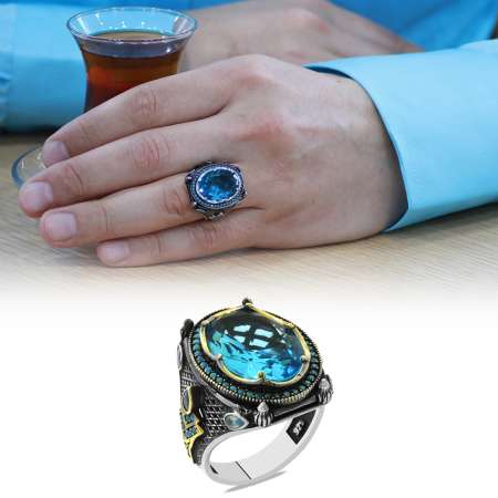Faset Kesim Turkuaz Zirkon Taşlı Yanları Meşale Detaylı 925 Ayar Gümüş Erkek Yüzük - Tesbihane